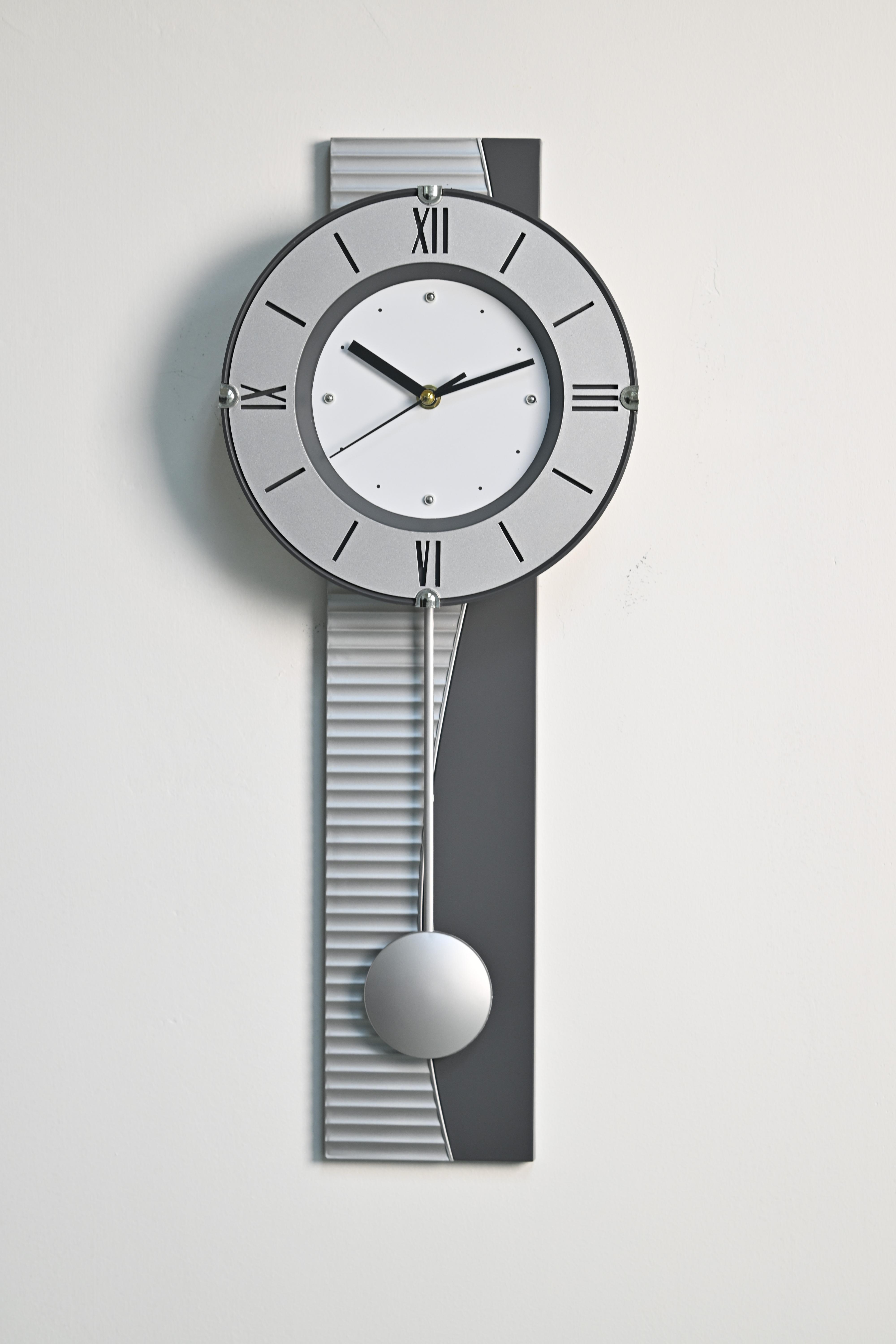 Plastic Pendulum Wall Clock - TP7010 Silver